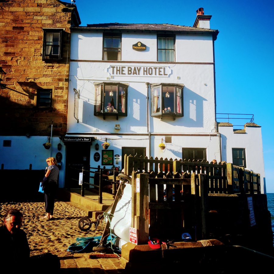 SITTING  ON THE DOCK OF (ROBIN HOOD’S)&nbsp;BAY